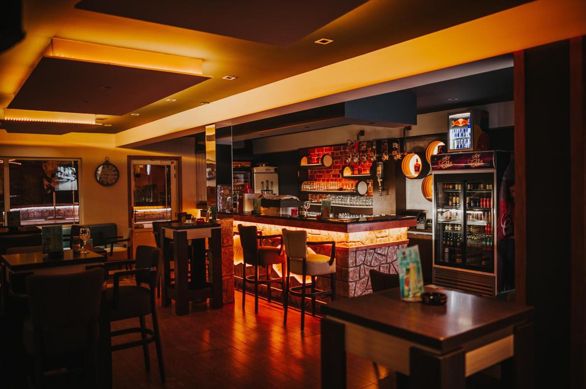 Caffe club Macao Logo