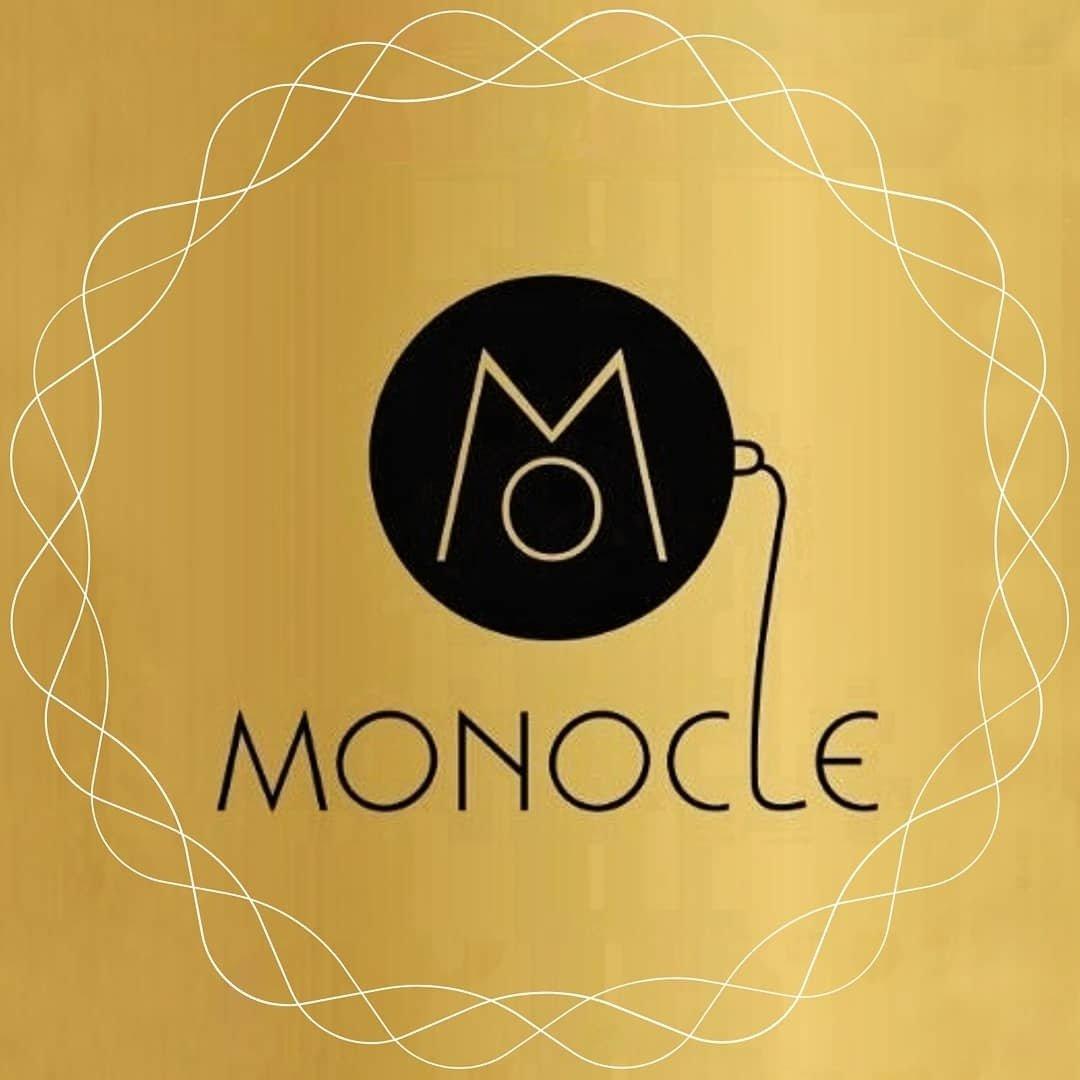 Optika Monocle Logo